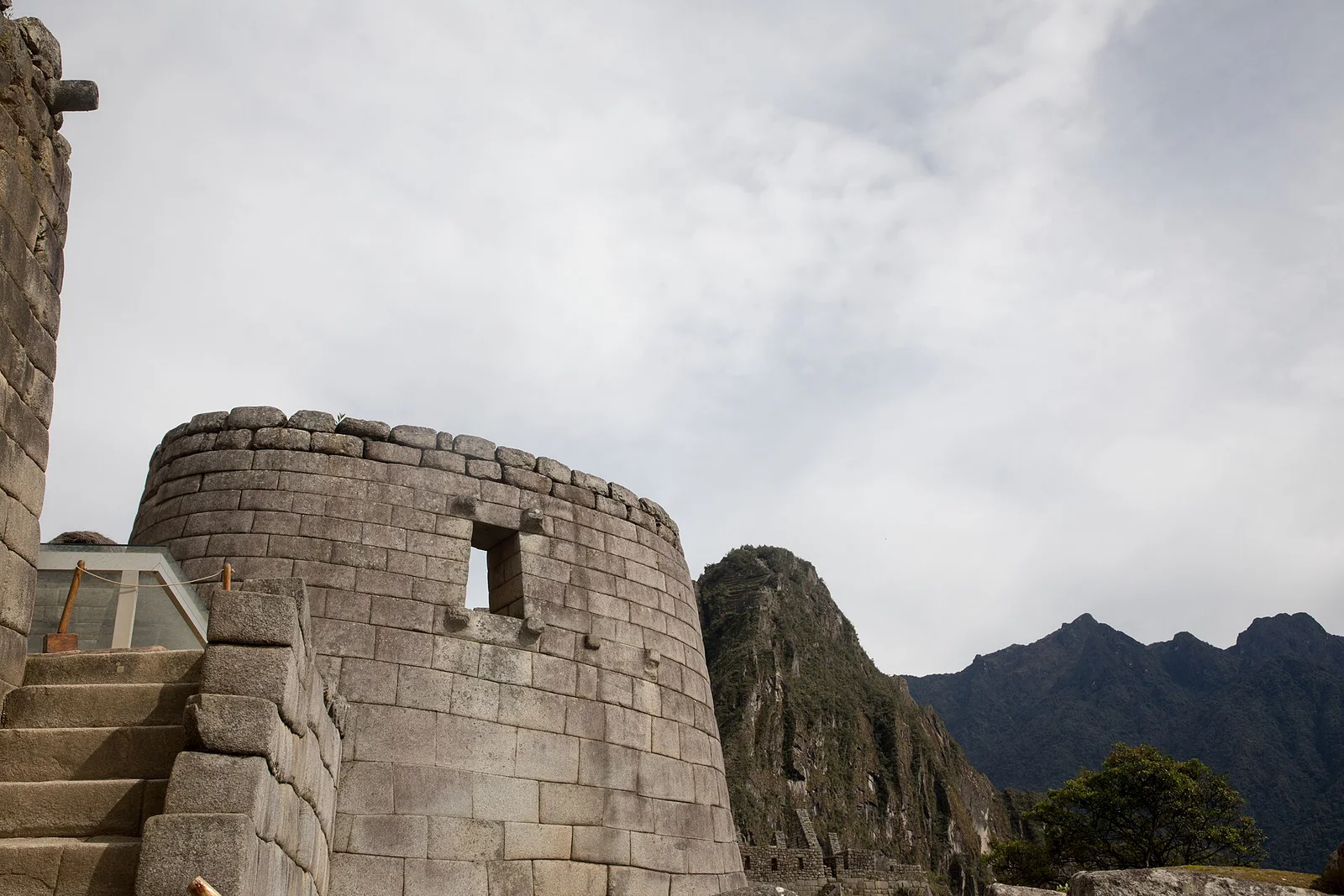 Historic Sanctuary of Machu Picchu: Looking up at the Temple of the Sun in Machu Picchu