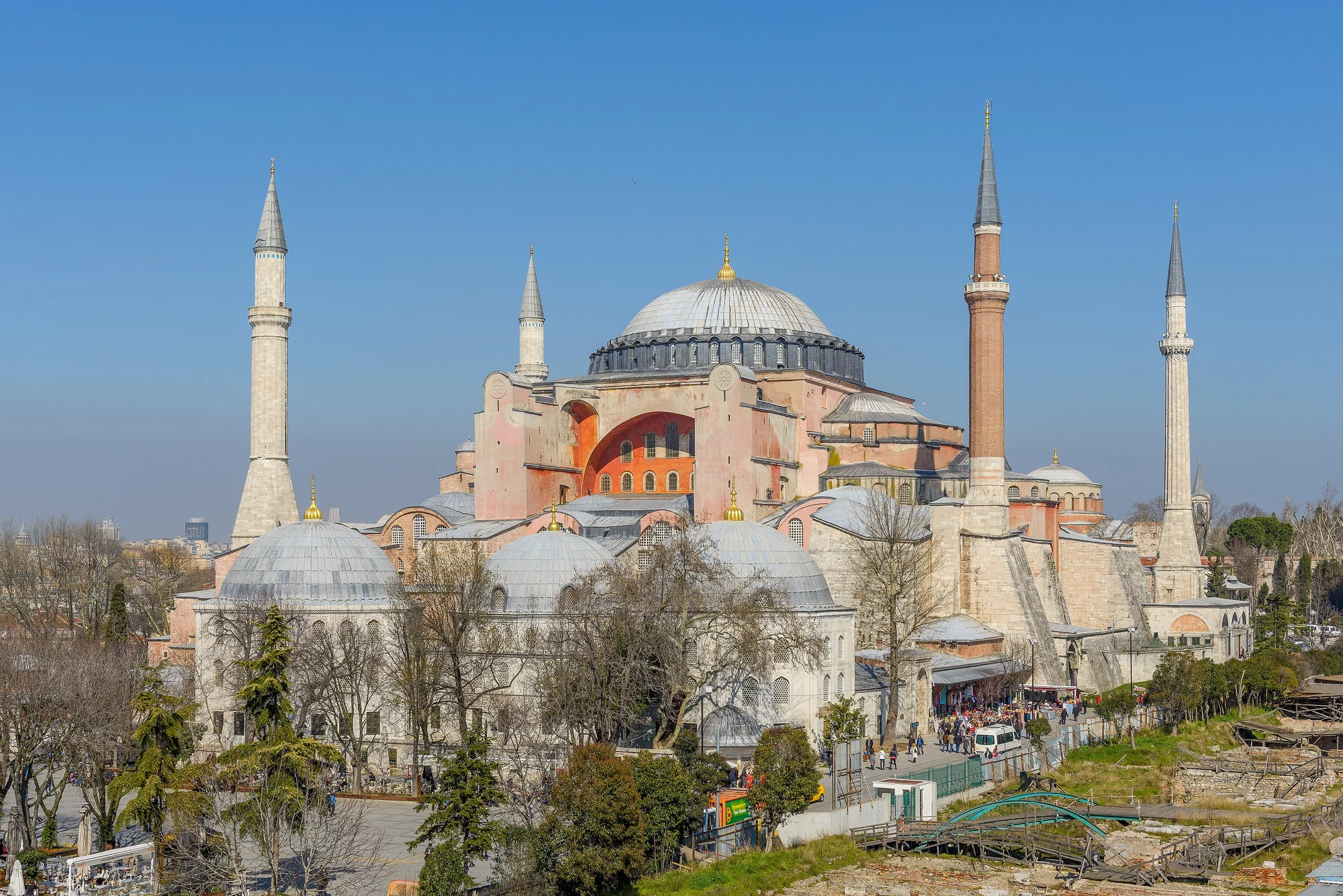 Exterior of Hagia Sophia in Istanbul, showing its great central dome, buttresses, and Ottoman minarets added after the 1453 conquest